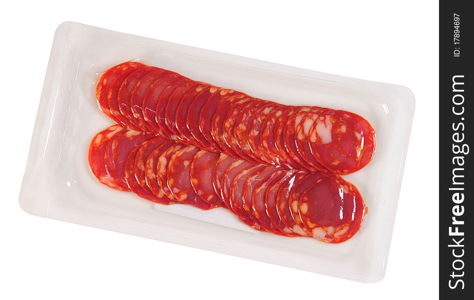 Slices of cured ham in a white tray for packaging. Slices of cured ham in a white tray for packaging.