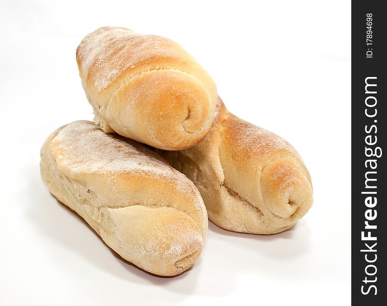 Tree yellow breads isolated on white background