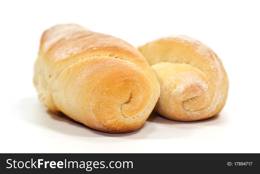 Two yellow breads isolated on white background