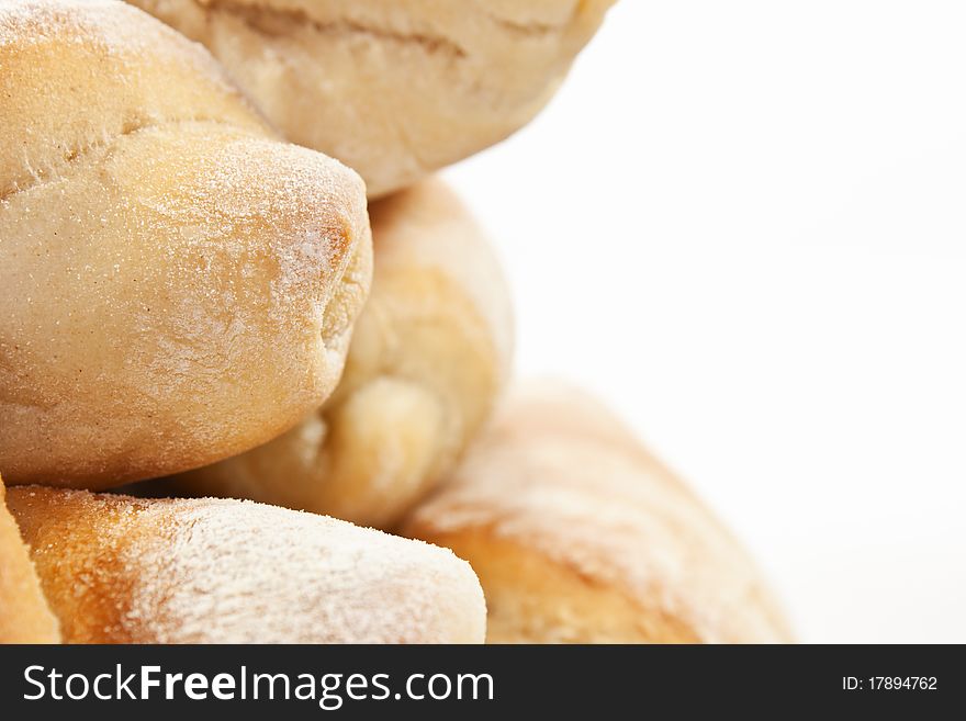 Yellow, beaked breads isolated on white background