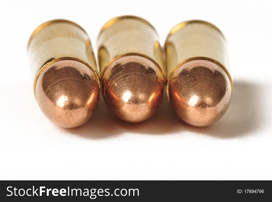 Three 9mm bullets pointed forward