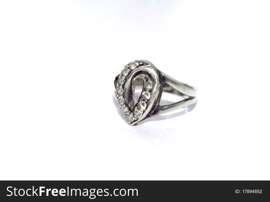 A silver ring with zirconium decoration. A silver ring with zirconium decoration