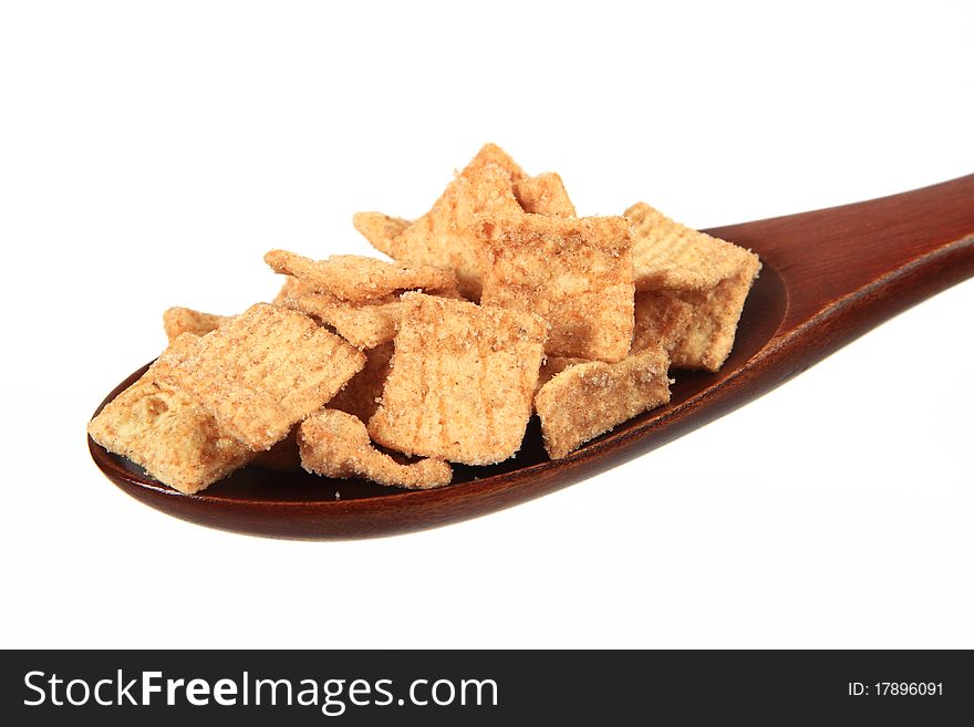 Cereals on spoon isolated on white