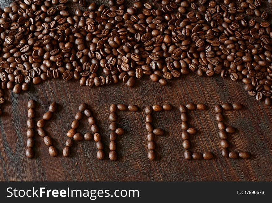 Coffee bean arranged on a wooden table