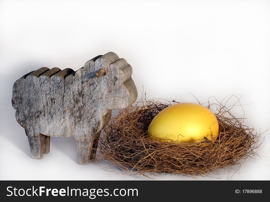 Easter eggs arranged with some decoration on a neutral background.