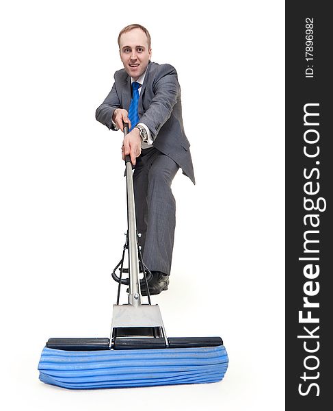 Businessman with a mop washes the floor on a white background