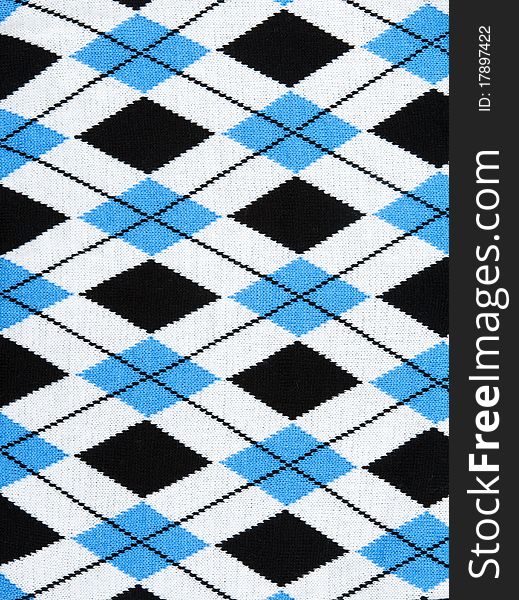 Background from knitted plaid fabrics with pattern