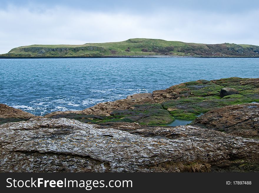 A view of Portmuck Island, Portmuck, Islandmagee, County Antrim, Ireland.