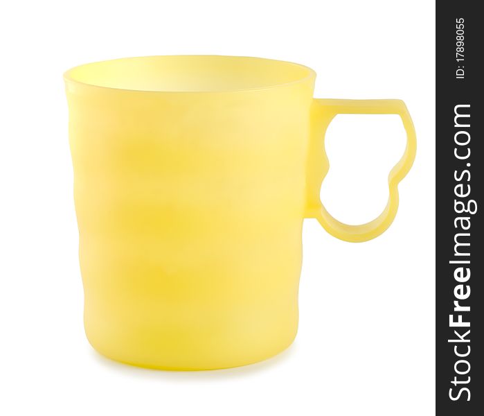 Yellow mug isolated on a white background. Yellow mug isolated on a white background