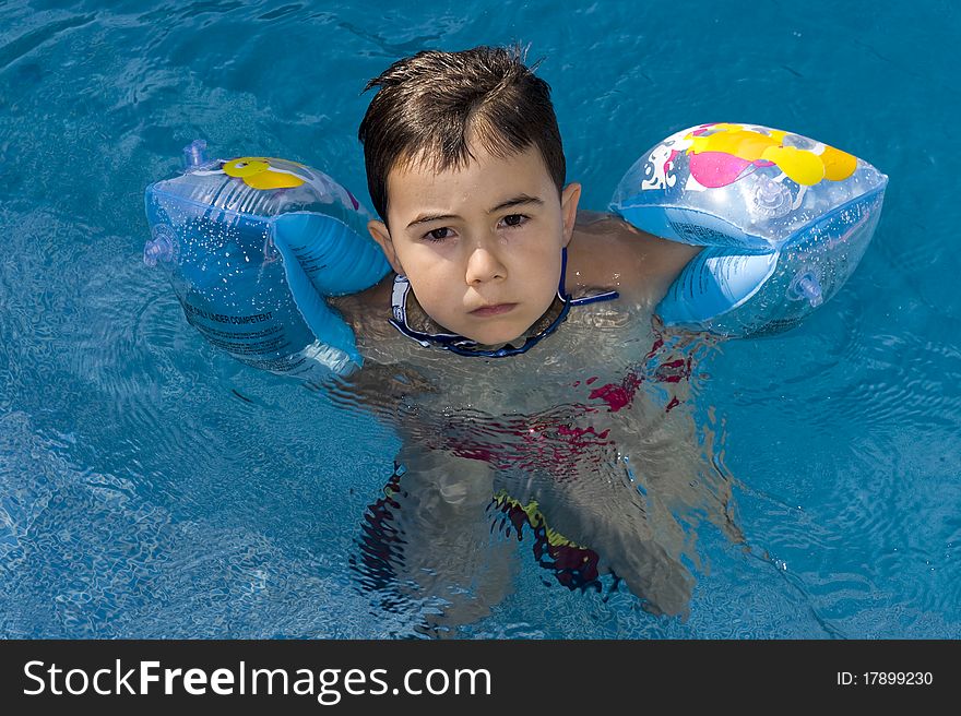 Boy in the swimming pool