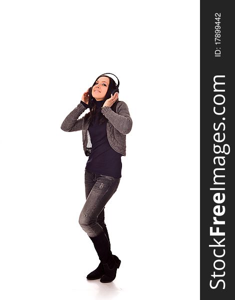 Photo of dancing woman with headphones on isolated background