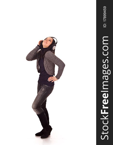 Photo of dancing woman with headphones on isolated background