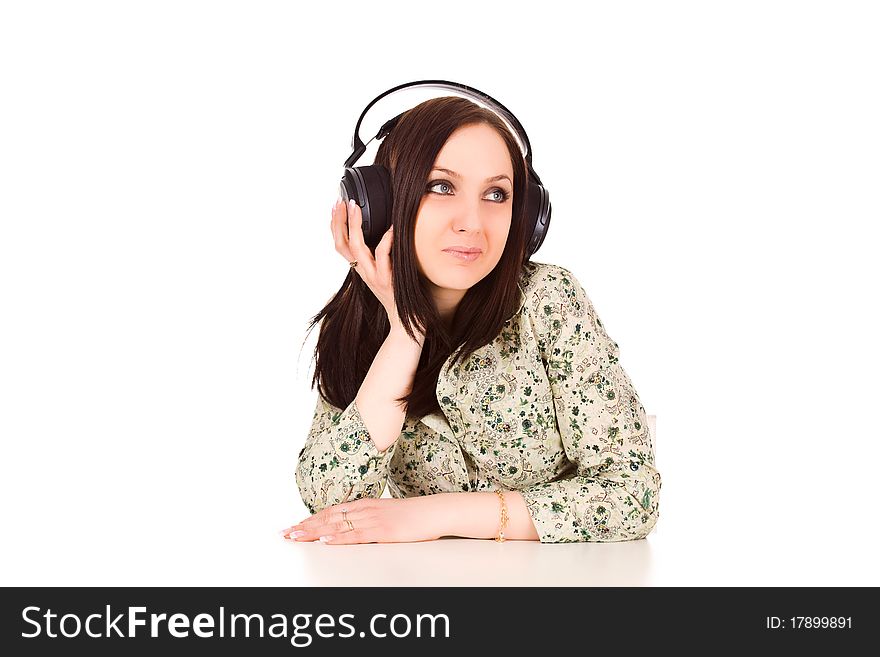 Photo of cute woman with headphones is listening to musc