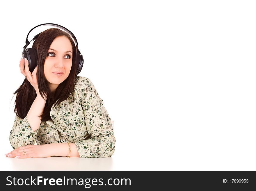 Photo of cute woman with headphones is listening to musc