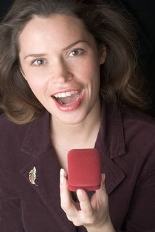 Pretty Brunette Is Very Happy To Receive A Present Royalty Free Stock Photography Pretty Brunette Is Very Happy To Receive A Present Royalty Free Stock Photography