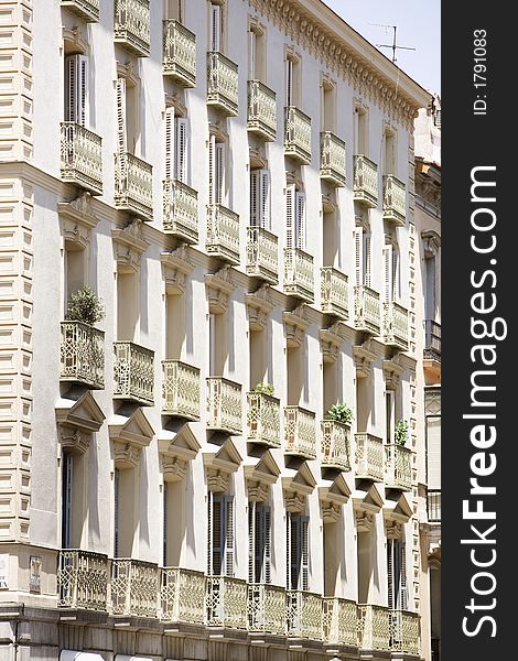 An apartment building in Europe with balconies. An apartment building in Europe with balconies.