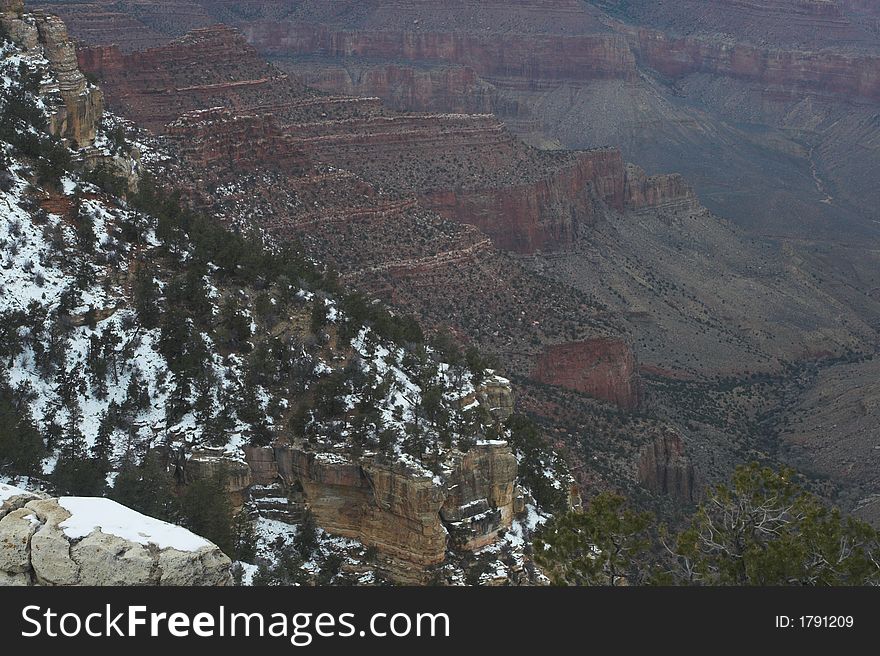 Scenic View of Grand Canyon with Snow on the edge
