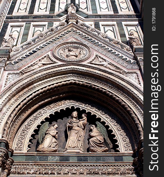 The archway above the main entryway of the Cathedral in Florence, Italy