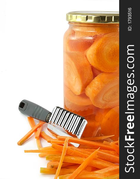Carrots cut on slices and laid in glass container. Carrots cut on slices and laid in glass container