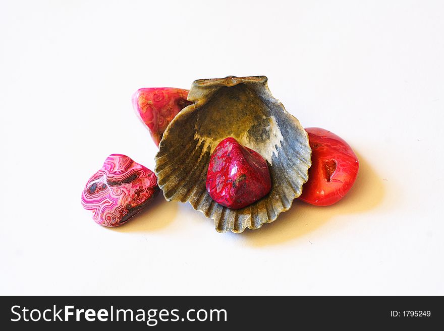 Sea shell with colorful stones. Sea shell with colorful stones