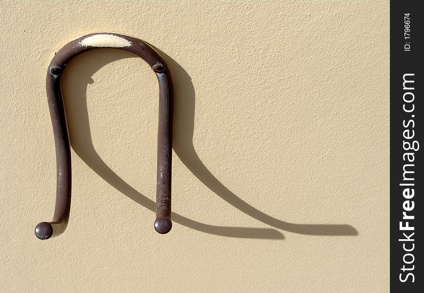 Metal hanger for hanging bicycle