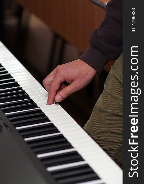 Playing piano classic music. Sound note. Shallow depth of field, diagonal view. Playing piano classic music. Sound note. Shallow depth of field, diagonal view