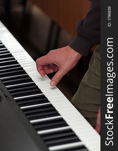 Playing piano classic music. Sound note. Shallow depth of field, diagonal view. Playing piano classic music. Sound note. Shallow depth of field, diagonal view