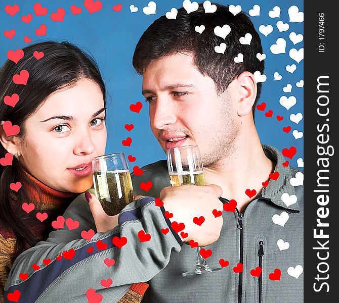 Young people with champagne glasses surrounded by rendered hearts