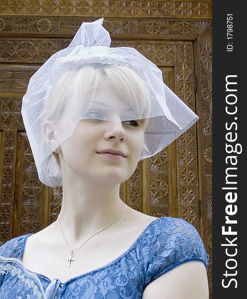 Young bride portrait before the church ceremony