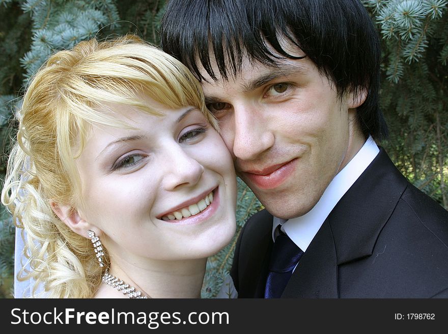 Young bride and groom portrait after the church ceremony