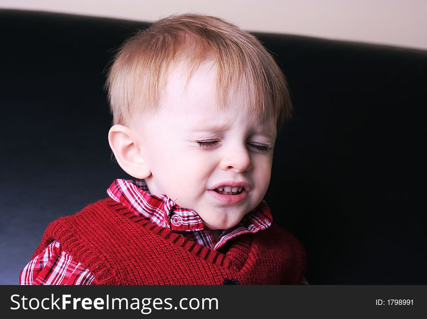 Squinting toddler boy vest plaid shirt. Squinting toddler boy vest plaid shirt