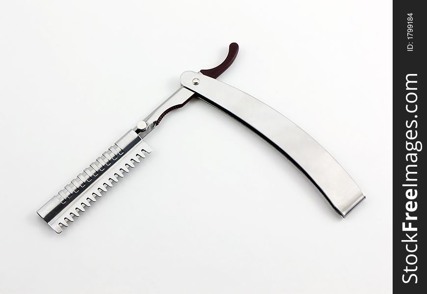 Photo of a feathering or straight razor. Photo of a feathering or straight razor