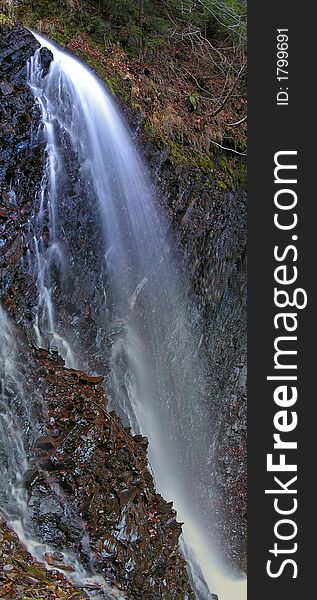 Carpathian Waterfall. The waterfall is located near to small town Yaremcha on inflow of the river Zhenets. Height of a falls about 12 meters. Carpathian Waterfall. The waterfall is located near to small town Yaremcha on inflow of the river Zhenets. Height of a falls about 12 meters.