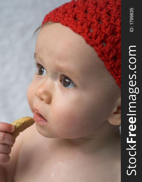 Image of baby eating a cookie. Image of baby eating a cookie