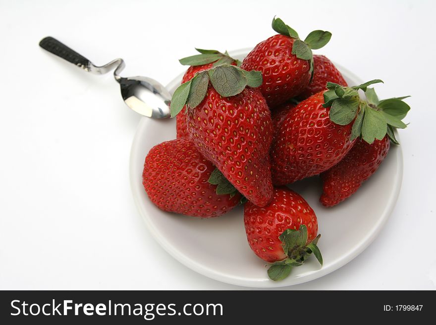 Group of the Strawberry on white plate. Group of the Strawberry on white plate