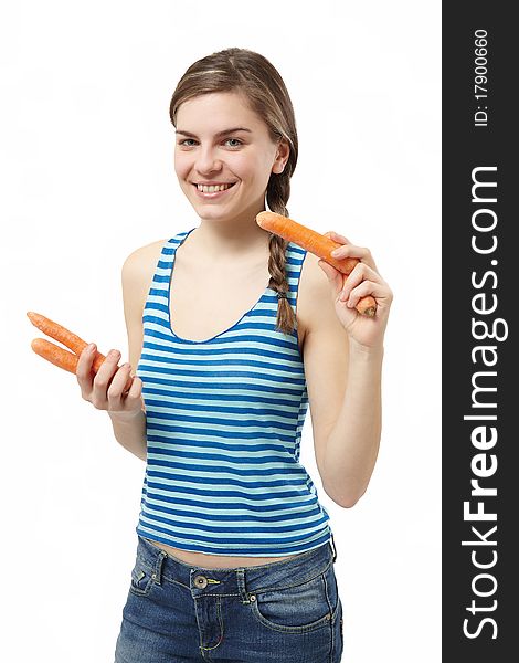 Young girl with four fresh carrots isolated on white