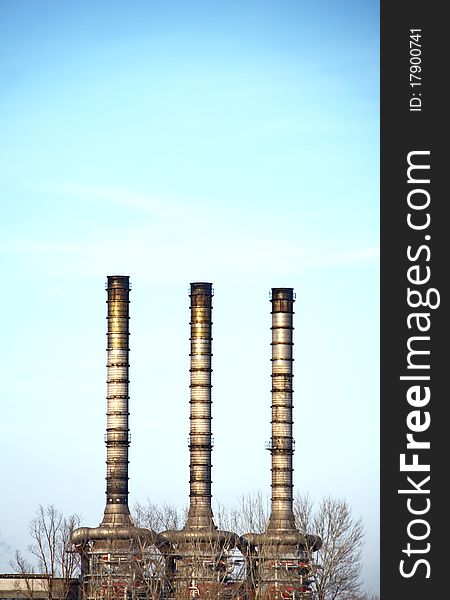 Image of a heating station chimneys near the river