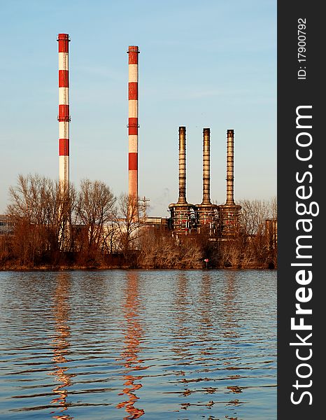 Image of a heating station chimneys near the river