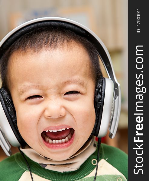 Child and headphone