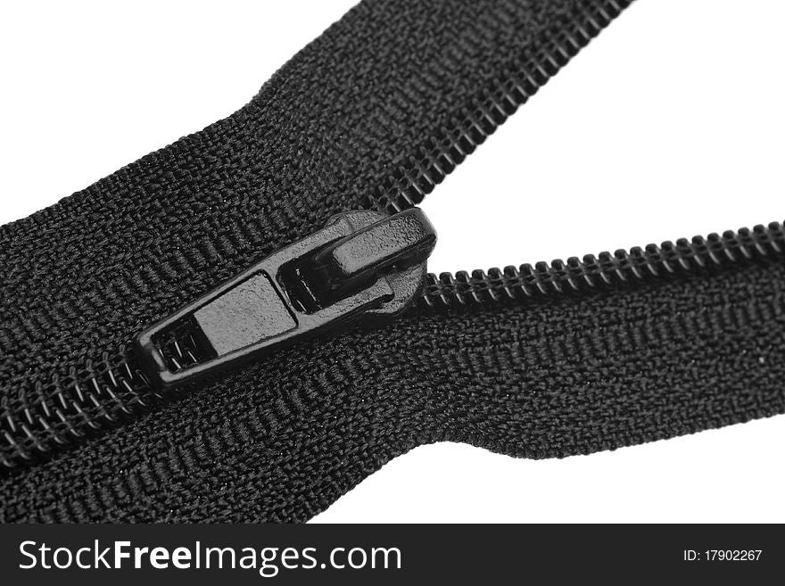 Black zipper closeup. isolated on white background