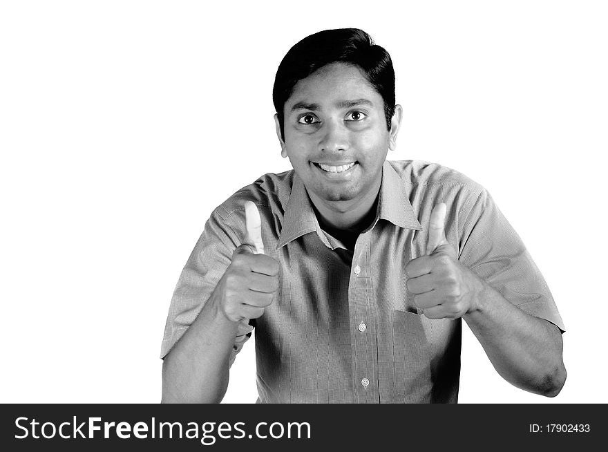 An handsome Indian man showing hands for success. An handsome Indian man showing hands for success