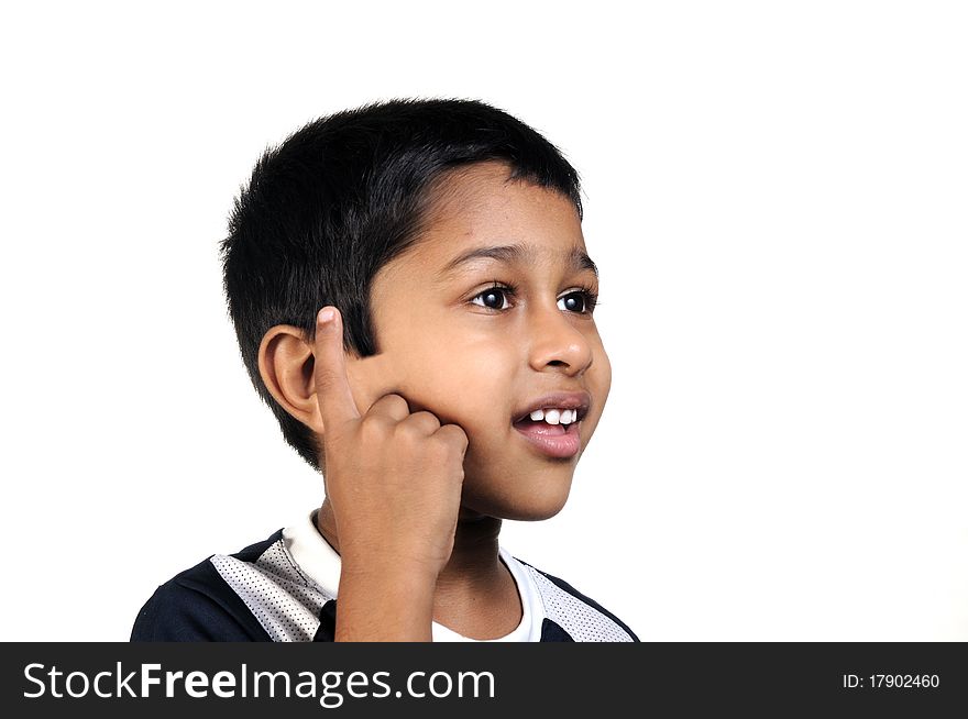 An handsome young indian kid thinking about something