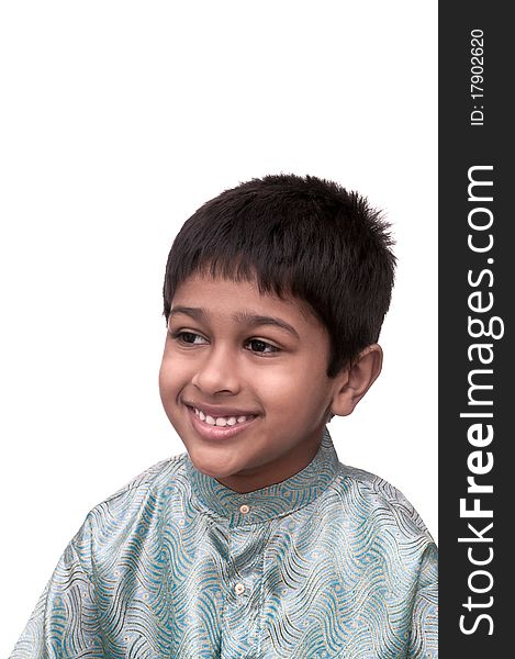 An handsome indian kid smiling for you