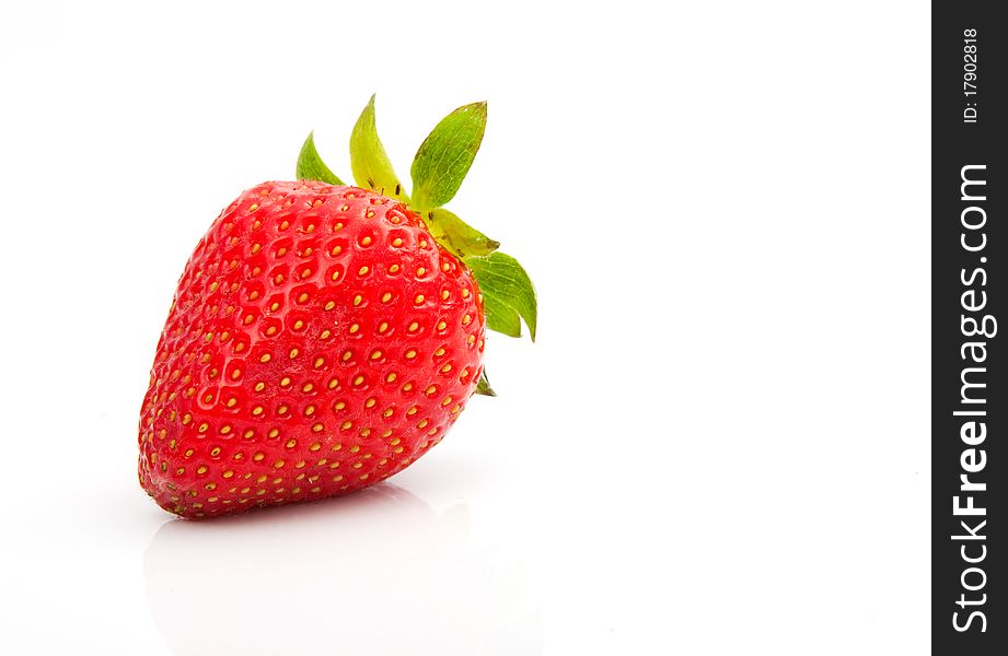 A red strawberry, isolated on a white background.