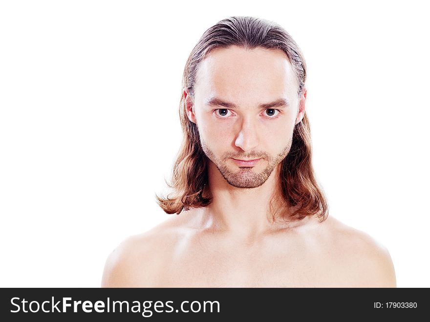 Confident young man with long hair and bristle. Confident young man with long hair and bristle