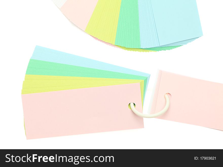 Paper and ring on a white background