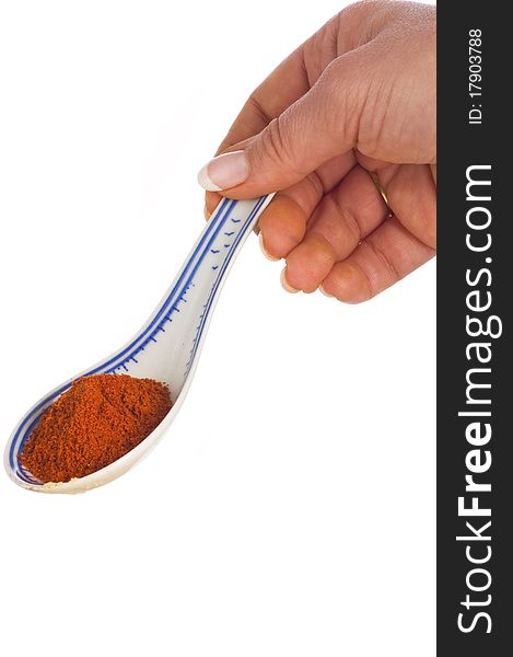 Red spice paprica in spoon