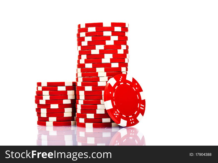 Stacks of poker chips on a white background