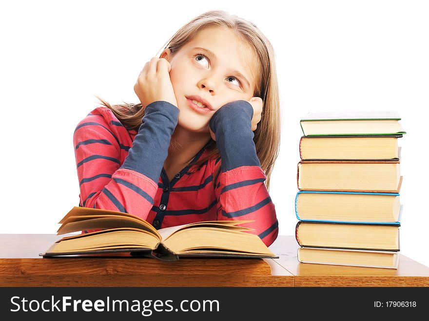 Portrait of a beautiful schoolgirl reading a book on white background