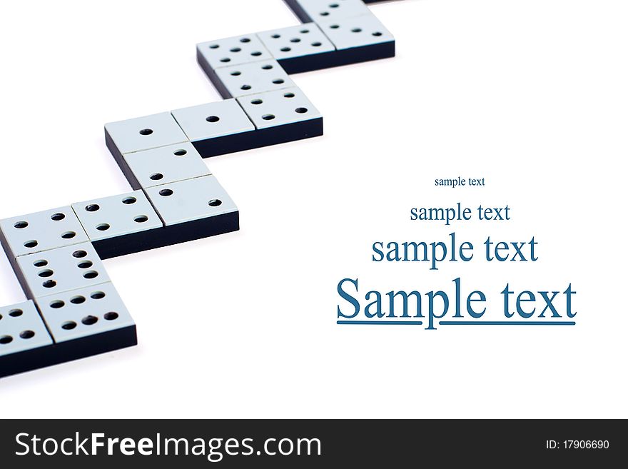 Domino pieces in a line or zigzag on white background